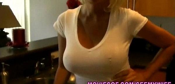  Big tits blonde wife strips down and masturbates in the kitchen